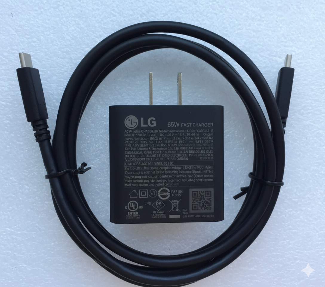 65W black power adapter front view