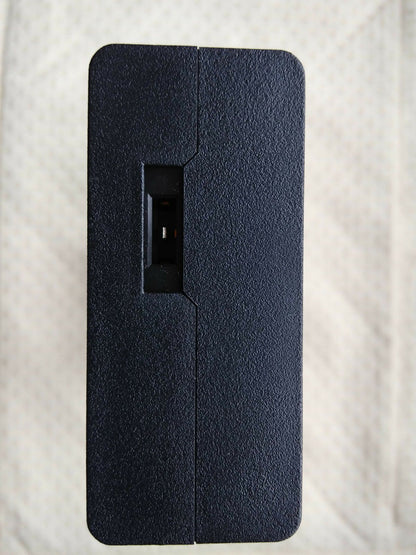 Close-up view of output port on Sony ACDP-240E01 adapter, 24V 9.4A DC output.